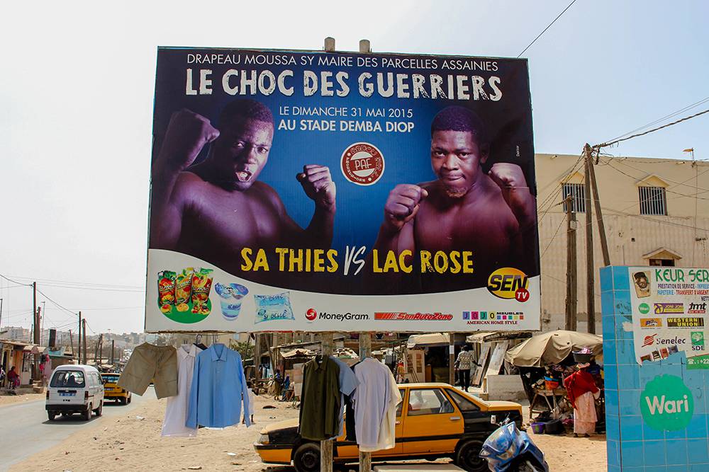 Advertising billboard announcing the combat between Sa Thies and Lac Rose