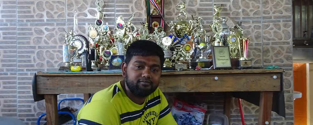 Indo-Trinidadian Cricketer with his Trophies - image by Adnan Hossain