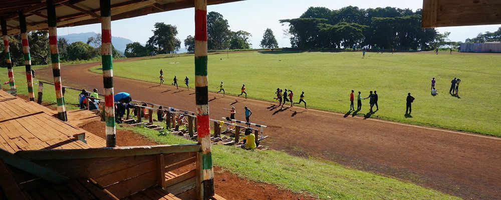 Runners Complete 1,000 Meter Repeats at the Kamariny Stadium, Iten - image by Michael Peters