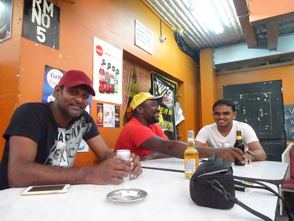 Former Guyanese West Indies Cricket Team players "liming", i.e. engaging in the art of doing nothing, in Trinidad, April 2015 (Photo Adnan Hossain)
